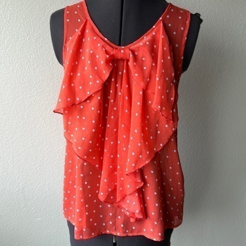 A. Byer top small polka dot melon and white bown in front balletcore